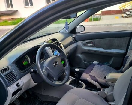 Черный Киа Черато, объемом двигателя 1.6 л и пробегом 200 тыс. км за 3999 $, фото 1 на Automoto.ua