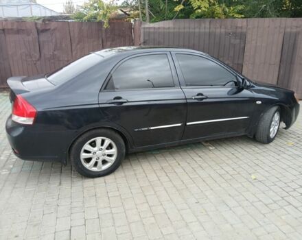 Черный Киа Черато, объемом двигателя 2 л и пробегом 250 тыс. км за 3700 $, фото 4 на Automoto.ua