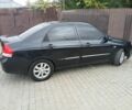 Черный Киа Черато, объемом двигателя 2 л и пробегом 250 тыс. км за 3700 $, фото 4 на Automoto.ua