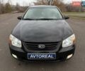 Чорний Кіа Черато, об'ємом двигуна 1.6 л та пробігом 224 тис. км за 4900 $, фото 14 на Automoto.ua