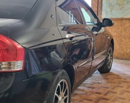 Черный Киа Черато, объемом двигателя 1 л и пробегом 193 тыс. км за 4600 $, фото 2 на Automoto.ua