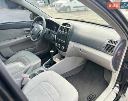 Чорний Кіа Черато, об'ємом двигуна 1.6 л та пробігом 272 тис. км за 5200 $, фото 9 на Automoto.ua