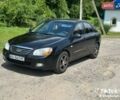 Чорний Кіа Черато, об'ємом двигуна 1.6 л та пробігом 213 тис. км за 3999 $, фото 9 на Automoto.ua