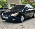 Черный Киа Черато, объемом двигателя 1.98 л и пробегом 155 тыс. км за 5100 $, фото 1 на Automoto.ua