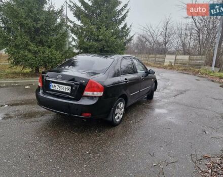 Черный Киа Черато, объемом двигателя 1.6 л и пробегом 280 тыс. км за 4300 $, фото 3 на Automoto.ua