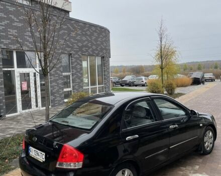 Черный Киа Черато, объемом двигателя 1.6 л и пробегом 256 тыс. км за 4200 $, фото 5 на Automoto.ua