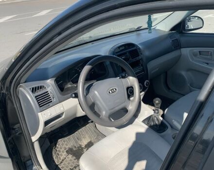 Черный Киа Черато, объемом двигателя 1.6 л и пробегом 172 тыс. км за 3400 $, фото 5 на Automoto.ua