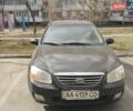Черный Киа Черато, объемом двигателя 2 л и пробегом 422 тыс. км за 3300 $, фото 1 на Automoto.ua