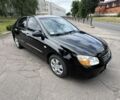Черный Киа Черато, объемом двигателя 0 л и пробегом 130 тыс. км за 5150 $, фото 2 на Automoto.ua