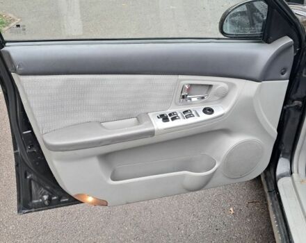 Черный Киа Черато, объемом двигателя 1.6 л и пробегом 258 тыс. км за 4300 $, фото 9 на Automoto.ua