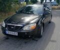 Чорний Кіа Черато, об'ємом двигуна 1.6 л та пробігом 297 тис. км за 3108 $, фото 1 на Automoto.ua