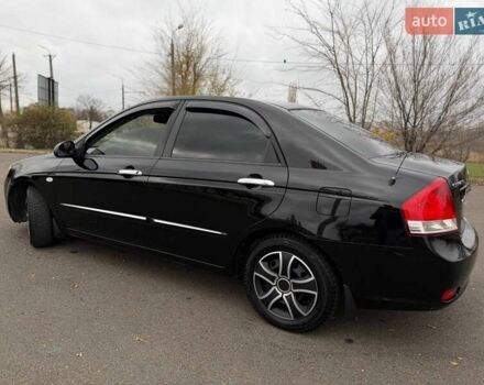 Чорний Кіа Черато, об'ємом двигуна 1.6 л та пробігом 224 тис. км за 4900 $, фото 28 на Automoto.ua