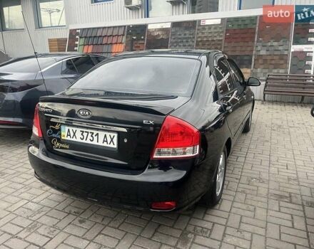 Черный Киа Черато, объемом двигателя 1.6 л и пробегом 180 тыс. км за 4900 $, фото 5 на Automoto.ua