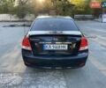 Черный Киа Черато, объемом двигателя 1.98 л и пробегом 335 тыс. км за 4100 $, фото 4 на Automoto.ua