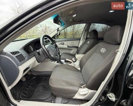 Чорний Кіа Черато, об'ємом двигуна 1.6 л та пробігом 224 тис. км за 4900 $, фото 31 на Automoto.ua