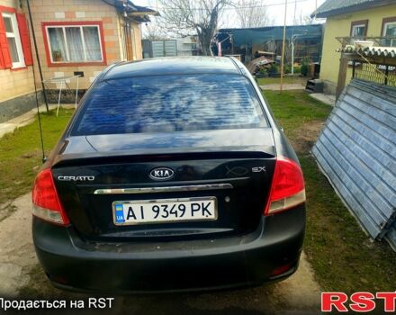 Черный Киа Черато, объемом двигателя 2 л и пробегом 215 тыс. км за 3000 $, фото 2 на Automoto.ua