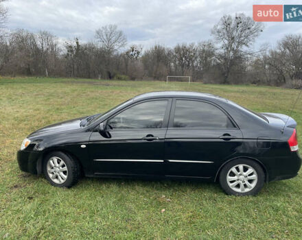 Черный Киа Черато, объемом двигателя 1.98 л и пробегом 315 тыс. км за 5745 $, фото 3 на Automoto.ua