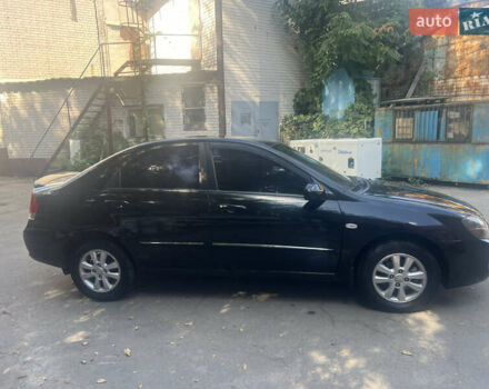 Чорний Кіа Черато, об'ємом двигуна 1.6 л та пробігом 290 тис. км за 5300 $, фото 4 на Automoto.ua