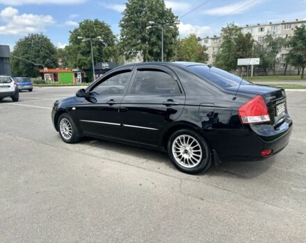 Черный Киа Черато, объемом двигателя 1.6 л и пробегом 272 тыс. км за 5200 $, фото 1 на Automoto.ua