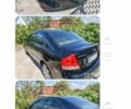 Чорний Кіа Черато, об'ємом двигуна 1.6 л та пробігом 217 тис. км за 5000 $, фото 1 на Automoto.ua