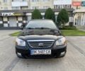Чорний Кіа Черато, об'ємом двигуна 1.6 л та пробігом 111 тис. км за 4200 $, фото 1 на Automoto.ua
