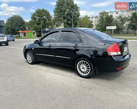 Чорний Кіа Черато, об'ємом двигуна 1.6 л та пробігом 272 тис. км за 5200 $, фото 4 на Automoto.ua