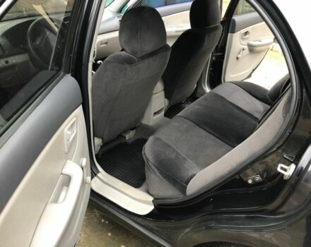 Черный Киа Черато, объемом двигателя 1.6 л и пробегом 240 тыс. км за 3300 $, фото 9 на Automoto.ua