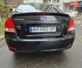 Черный Киа Черато, объемом двигателя 1.98 л и пробегом 180 тыс. км за 4500 $, фото 3 на Automoto.ua