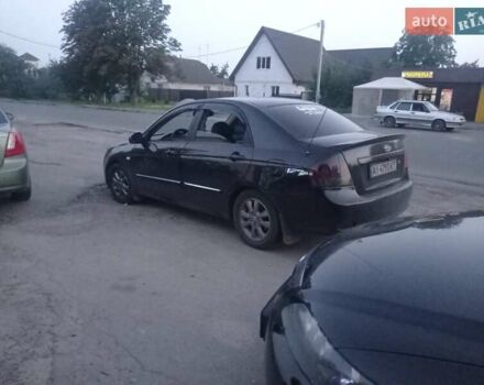 Черный Киа Черато, объемом двигателя 2 л и пробегом 340 тыс. км за 5500 $, фото 6 на Automoto.ua