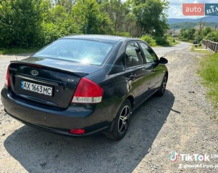 Чорний Кіа Черато, об'ємом двигуна 1.6 л та пробігом 213 тис. км за 3999 $, фото 3 на Automoto.ua