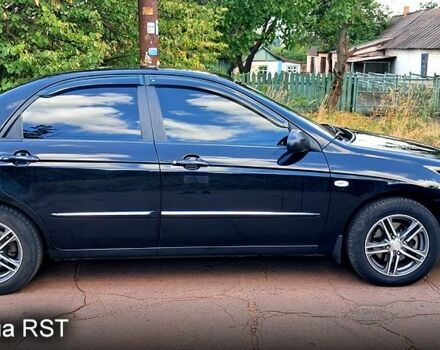 Черный Киа Черато, объемом двигателя 1.6 л и пробегом 260 тыс. км за 5300 $, фото 3 на Automoto.ua