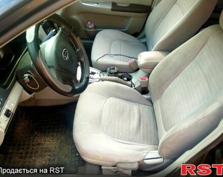 Черный Киа Черато, объемом двигателя 2 л и пробегом 215 тыс. км за 3000 $, фото 4 на Automoto.ua