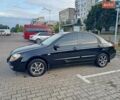 Черный Киа Черато, объемом двигателя 1.59 л и пробегом 208 тыс. км за 3800 $, фото 1 на Automoto.ua