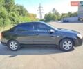 Чорний Кіа Черато, об'ємом двигуна 1.6 л та пробігом 206 тис. км за 4200 $, фото 7 на Automoto.ua