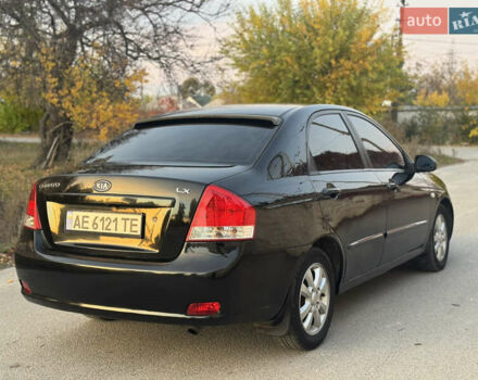 Черный Киа Черато, объемом двигателя 1.6 л и пробегом 235 тыс. км за 4900 $, фото 5 на Automoto.ua