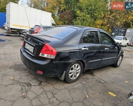 Чорний Кіа Черато, об'ємом двигуна 1.59 л та пробігом 200 тис. км за 1350 $, фото 6 на Automoto.ua