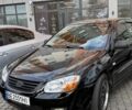 Черный Киа Черато, объемом двигателя 1.59 л и пробегом 450 тыс. км за 4200 $, фото 1 на Automoto.ua