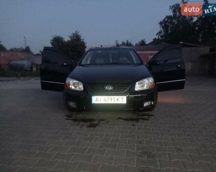Черный Киа Черато, объемом двигателя 2 л и пробегом 340 тыс. км за 5500 $, фото 4 на Automoto.ua