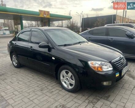 Черный Киа Черато, объемом двигателя 1.6 л и пробегом 180 тыс. км за 4900 $, фото 4 на Automoto.ua