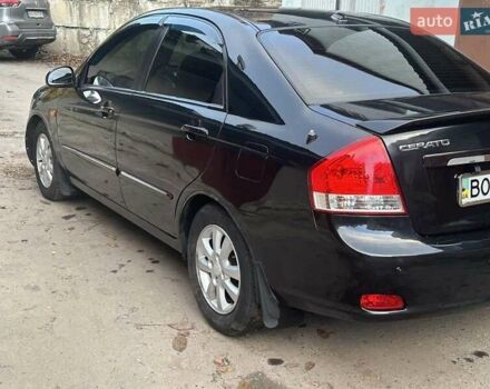 Черный Киа Черато, объемом двигателя 1.6 л и пробегом 230 тыс. км за 4950 $, фото 3 на Automoto.ua