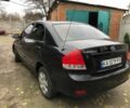 Черный Киа Черато, объемом двигателя 1.6 л и пробегом 240 тыс. км за 3300 $, фото 4 на Automoto.ua