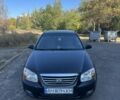 Чорний Кіа Черато, об'ємом двигуна 2 л та пробігом 310 тис. км за 3400 $, фото 1 на Automoto.ua