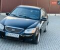 Черный Киа Черато, объемом двигателя 1.6 л и пробегом 210 тыс. км за 3650 $, фото 12 на Automoto.ua