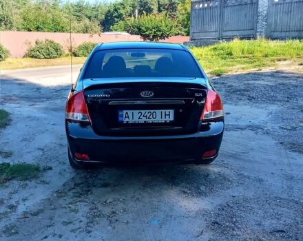 Чорний Кіа Черато, об'ємом двигуна 2 л та пробігом 203 тис. км за 5500 $, фото 3 на Automoto.ua