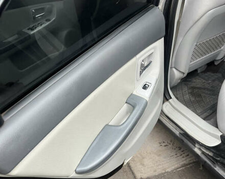 Черный Киа Черато, объемом двигателя 1.58 л и пробегом 355 тыс. км за 3500 $, фото 13 на Automoto.ua