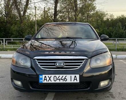 Чорний Кіа Черато, об'ємом двигуна 1.6 л та пробігом 264 тис. км за 4370 $, фото 1 на Automoto.ua