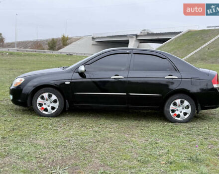 Черный Киа Черато, объемом двигателя 1.59 л и пробегом 312 тыс. км за 3000 $, фото 1 на Automoto.ua