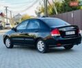 Киа Черато 2007 в Черновцах на Automoto.ua Черный Киа Черато, объемом двигателя 1.6 л и пробегом 210 тыс. км за 3950 $, фото 10 на Automoto.ua