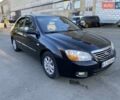 Черный Киа Черато, объемом двигателя 1.98 л и пробегом 335 тыс. км за 4100 $, фото 7 на Automoto.ua