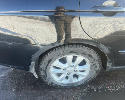 Черный Киа Черато, объемом двигателя 1.58 л и пробегом 355 тыс. км за 3500 $, фото 3 на Automoto.ua